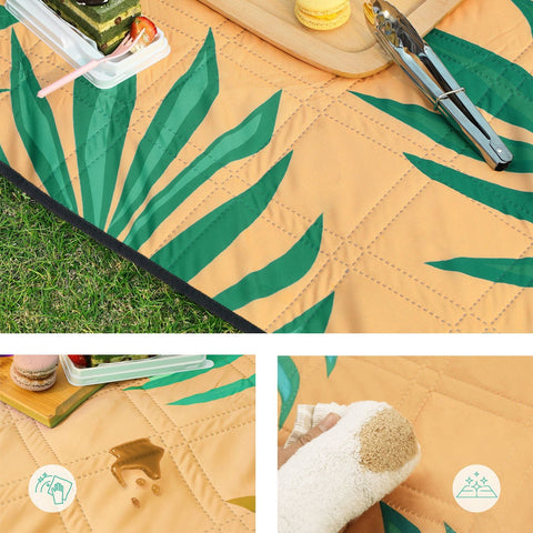 Rootz Picknickkleed - Outdoormat - Strandkleed - Waterdicht polyester - Lichtgewicht schuimvulling - Aluminium coating - 200cm x 150cm - Oranje met tropische varen